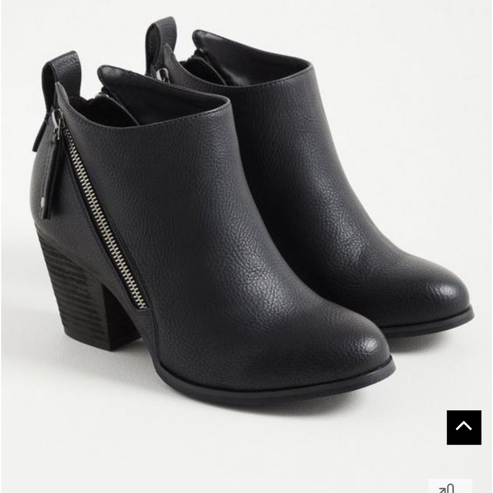 Women’s size 11 Torrid Black Ankle Boots. Brand New..Never worn.Do not have box.